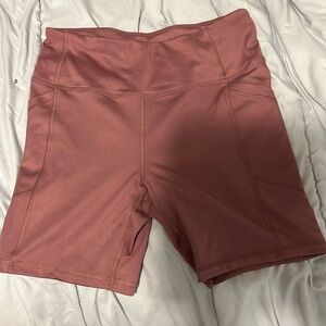 Brand new with tags purple Avis size medium biker shorts or workout shorts